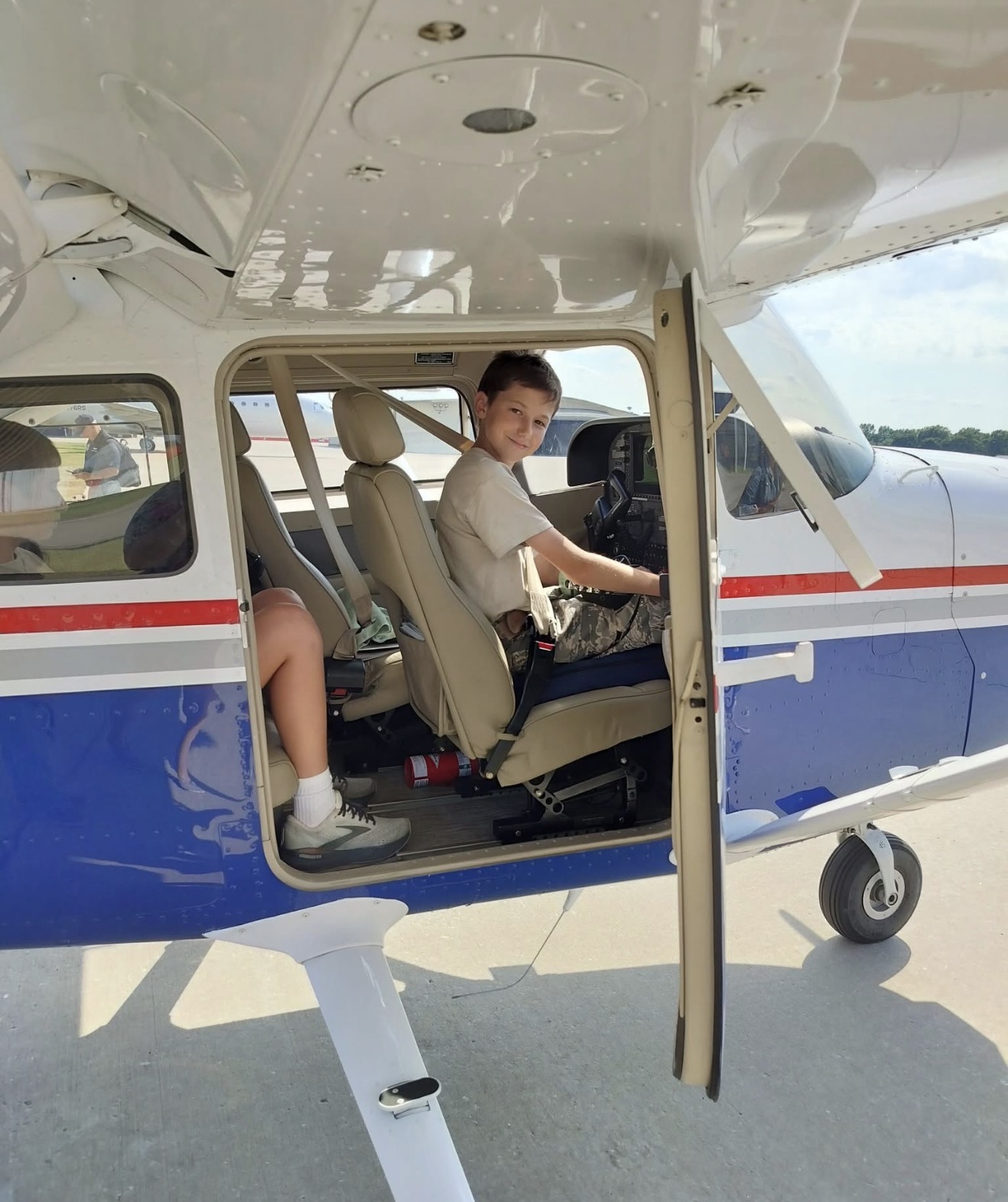 Future pilot at the controls of a Cessna aircraft